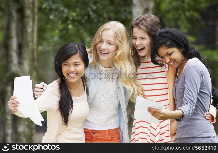 Four Teenage Girls Celebrating Successful Exam Results