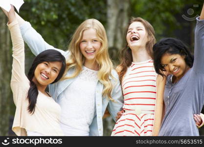 Four Teenage Girls Celebrating Successful Exam Results