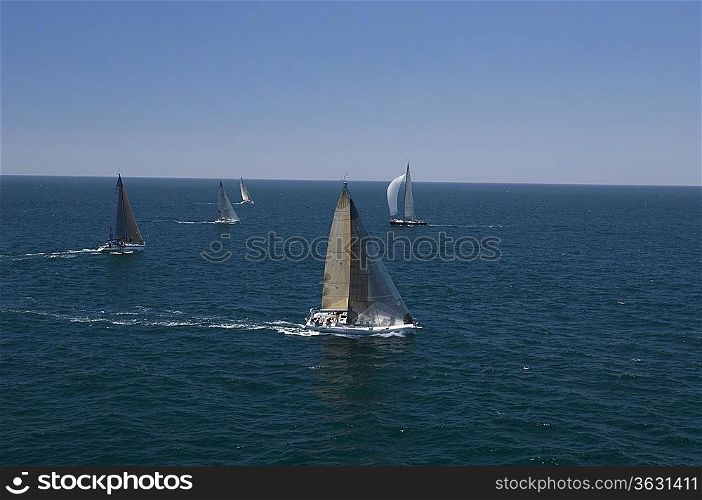 Four yachts compete in team sailing event California