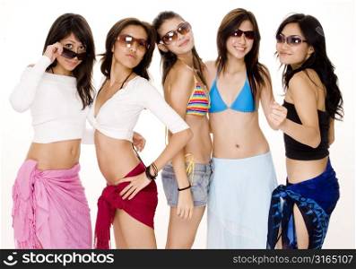 Four young women and a teenage girl posing