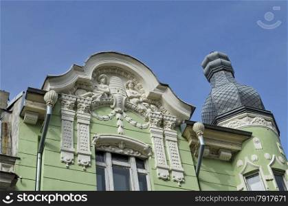 Fragment of ancient building with rich decoration in center of Ruse town