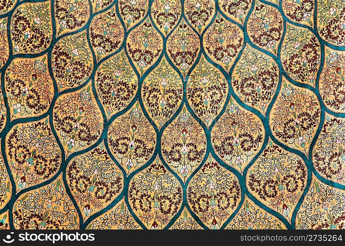 fragment of carpet with floral ornament