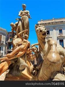 Fragment of Diana fountain (installed by Giulio Moschetti in 1907) in the center of Siracusa - piazza Archimede. Ortigia island at city of Syracuse, Sicily, Italy. Beautiful travel photo of Sicily.