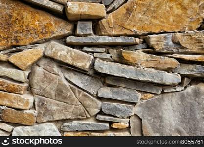 Fragment of masonry with brown stones