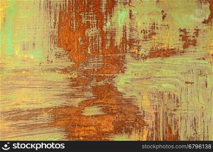 Fragment of old rusty metal sheet covered with green paint