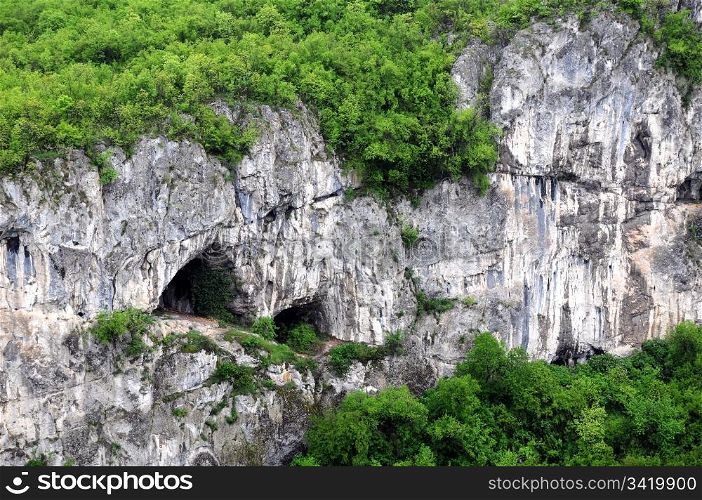 Fragment of the limestone rock in Balkan mountains near the cities of Dryanovo and Veliko Tarnovo in Bulgaria