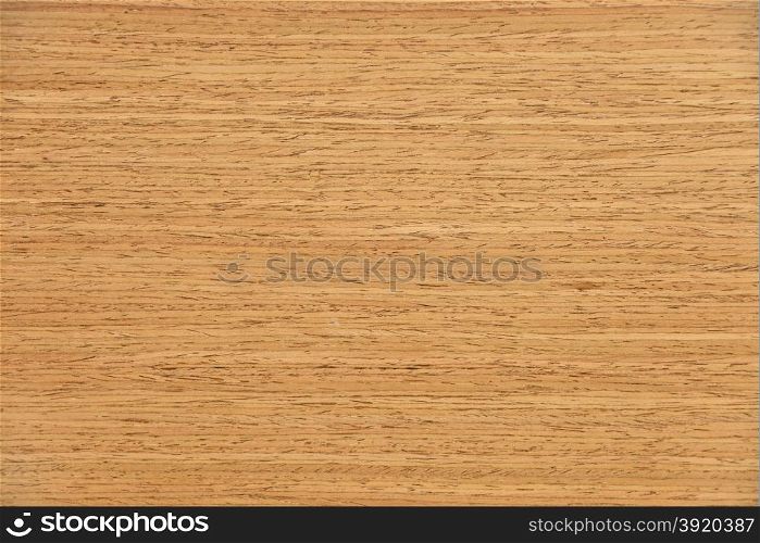 Fragment of wooden panel in dark brown spotted closeup