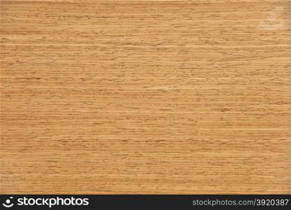 Fragment of wooden panel in dark brown spotted closeup