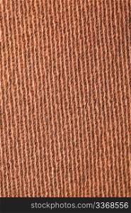 fragment pile carpet, brown-yellow with pattern, parallel lines. macro shooting