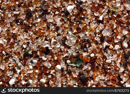 Fragments on Glass Beach in Kauai with old pieces of bottles