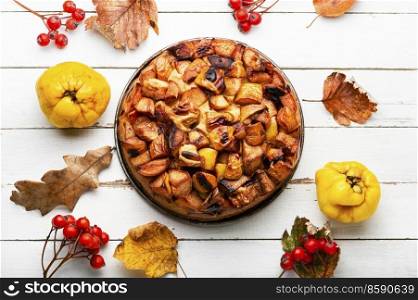 Fragrant autumn pie or cake with ripe quince. Autumn pie with quince
