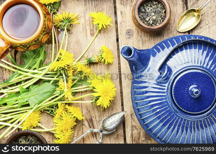 Fragrant herbal tea from flowering dandelions.Healthy dandelion tea.. Dandelion herbal tea