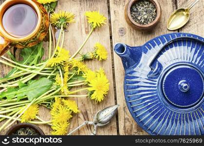 Fragrant herbal tea from flowering dandelions.Healthy dandelion tea.. Dandelion herbal tea