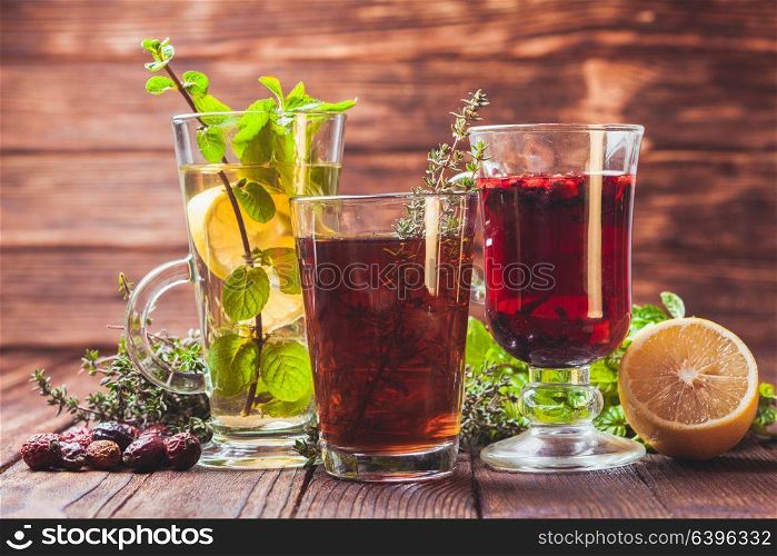 Fragrant herbal tea with thyme, mint, cranberry, lemon for healthy in winter. The herbal tea