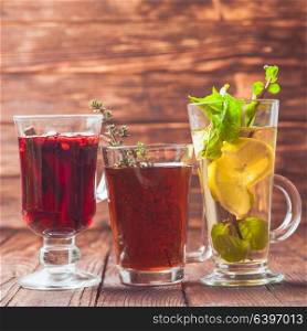 Fragrant herbal tea with thyme, mint, cranberry, lemon for healthy in winter. The herbal tea