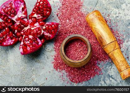 Fragrant spice made from pomegranate,Turkish seasoning.Crushed dried condiment. Oriental pomegranate spice.