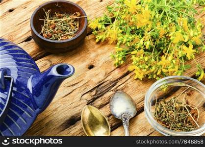 Fragrant useful herbal tea with hypericum.Herbal medicine.Tea with herbs.. Herbal tea with hypericum