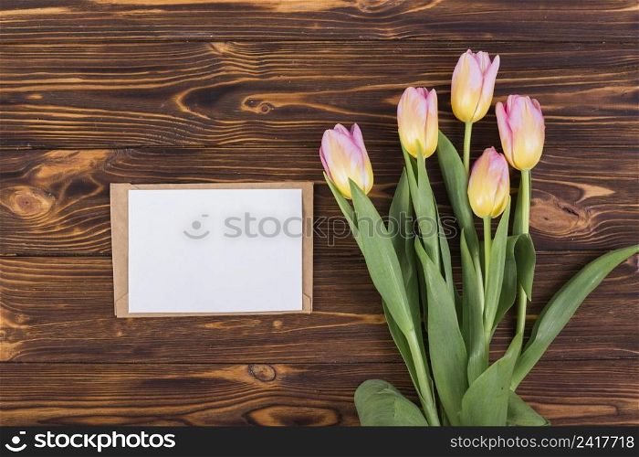 frame letter with bouquet tulips