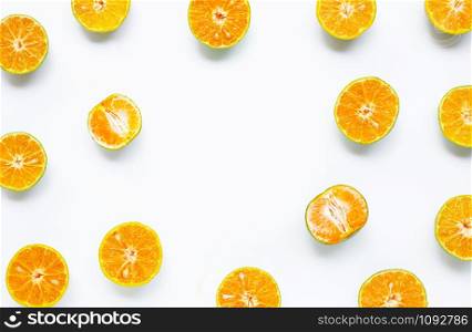 Frame made of fesh orange on white background.