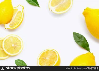 Frame made of fresh lemon with slices and leaves isolated on white background. Creative layout with copy space.