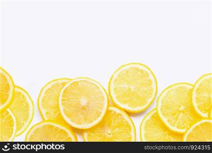 Frame made of fresh lemon with slices on white background. Copy space