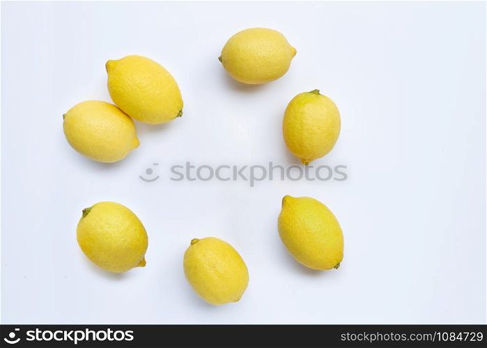 Frame made of fresh lemons on white background. Copy space