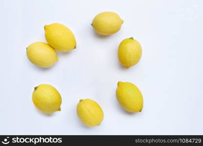 Frame made of fresh lemons on white background. Copy space