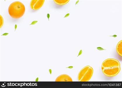 Frame made of fresh orange citrus fruit with leaves isolated on white background. Juicy and sweet