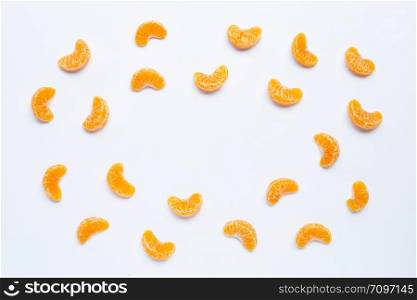 Frame made of mandarin segments, Fresh orange isolated on white background.