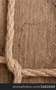 frame made of rope on a wooden background