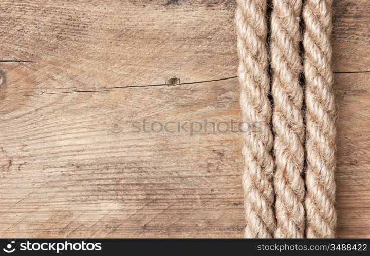 frame made of rope on a wooden background