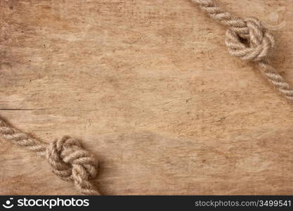 frame made of rope on a wooden background