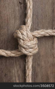 frame made of rope on a wooden background