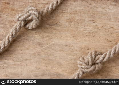 frame made of rope on a wooden background