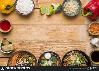 frame made with traditional thai food with vegetables wooden desk