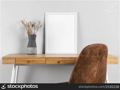 frame mock up table beside vase