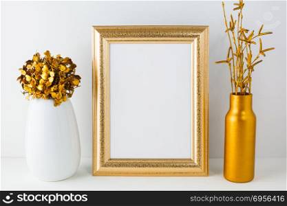 Frame mockup with golden vase. Frame mockup with golden vase. Frame mockup. Gold frame mockup. Poster Mockup. Styled mockup. Portrait frame mockup. Product mockup. Design Mockup. Empty frame mockup. White frame mockup.