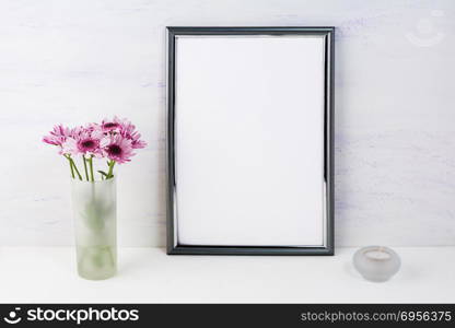 Frame mockup with lilac daisies. Frame mockup. Poster Mockup. Styled mockup. Product mockup. Design Mockup. Silver frame mockup. White frame mockup. Portrait frame mockup.. Frame mockup with lilac daisies