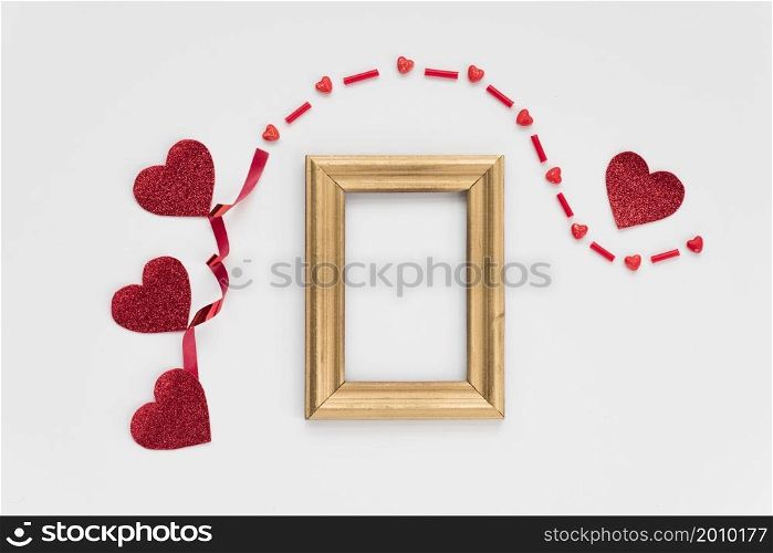 frame near ornament hearts band