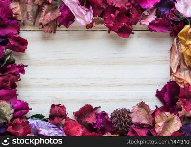 Frame of flower dry  on wood background