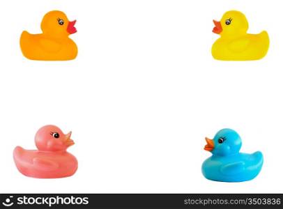 Frame of four plastic ducks isolated over white