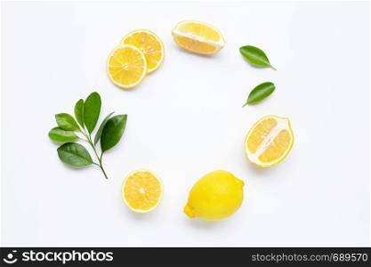 Frame of lemon and leaves with copy space on white background
