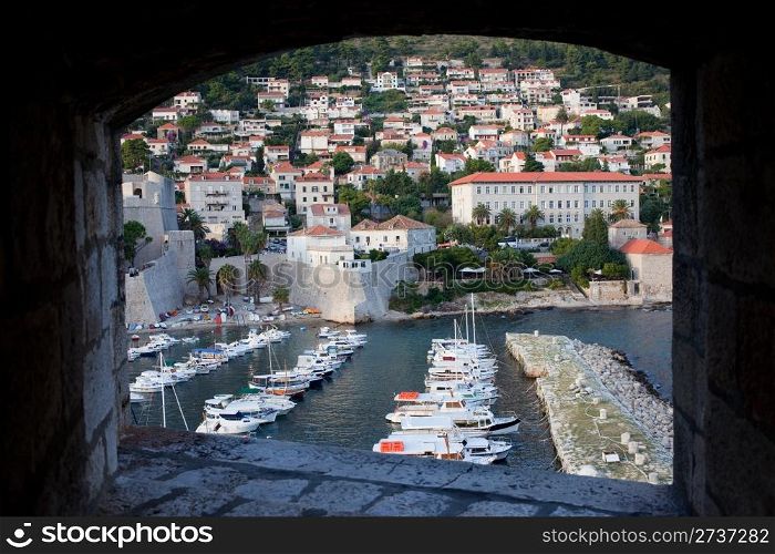 Framed view from city walls on the Dubrovnik marina an city