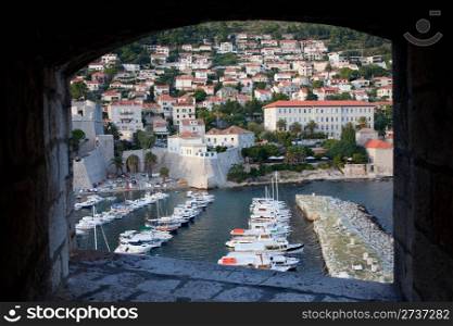Framed view from city walls on the Dubrovnik marina an city
