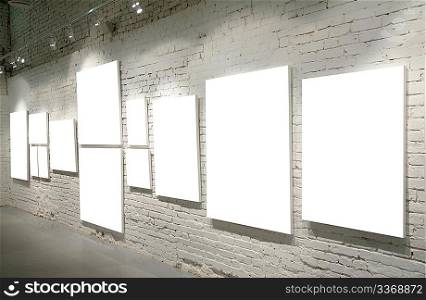 Frames on a brick wall