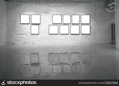 frames on white brick wall and reflections on floor