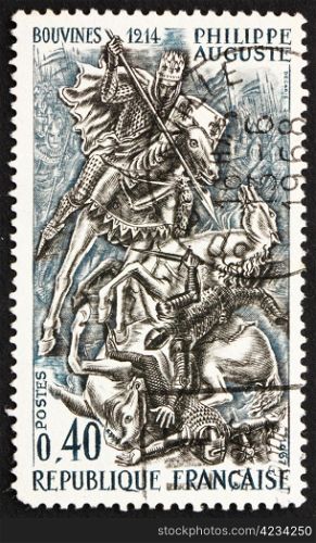 FRANCE - CIRCA 1967: a stamp printed in the France shows King Phillip II at Battle of Bouvines, 1214, circa 1967
