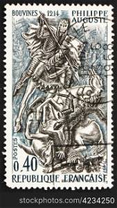 FRANCE - CIRCA 1967: a stamp printed in the France shows King Phillip II at Battle of Bouvines, 1214, circa 1967