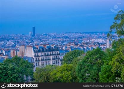 France. Paris. Early summer morning over the roofs. Parisian Roofs in the Early Morning
