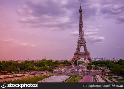 France. Paris. Eiffel Tower and fountains of the Trocadero Gardens. Pink summer evening. Pink Evening near the Eiffel Tower